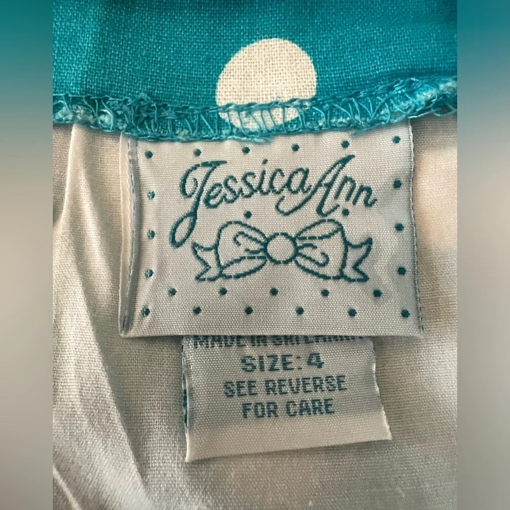 JESSICA ANN TURQUOISE SLEEVELESS DRESS WITH WHITE DOTS SIZE 4